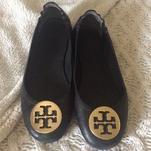 Fairly used Tory flats leather